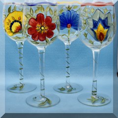 G26. 4 Hand painted wine glasses with flowers. 10” - $12